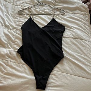 Bodysuit with sparkle straps